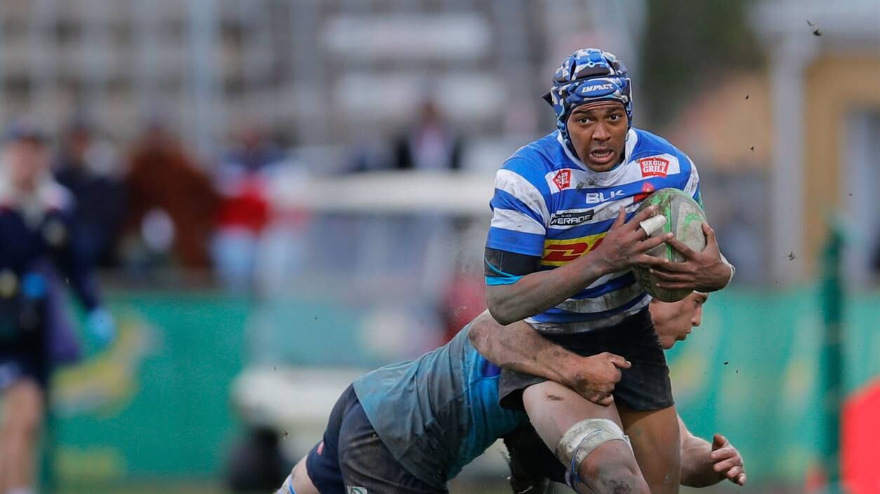 Die Westelike Provinsie en die Hoër Jongenskool Paarl (Boishaai) se JC Mars (heelagter) het die Bulle disnis gehardloop in die hoofwedstryd van die o. 18-Cravenweek-toernooi. Foto: Frans Lombard